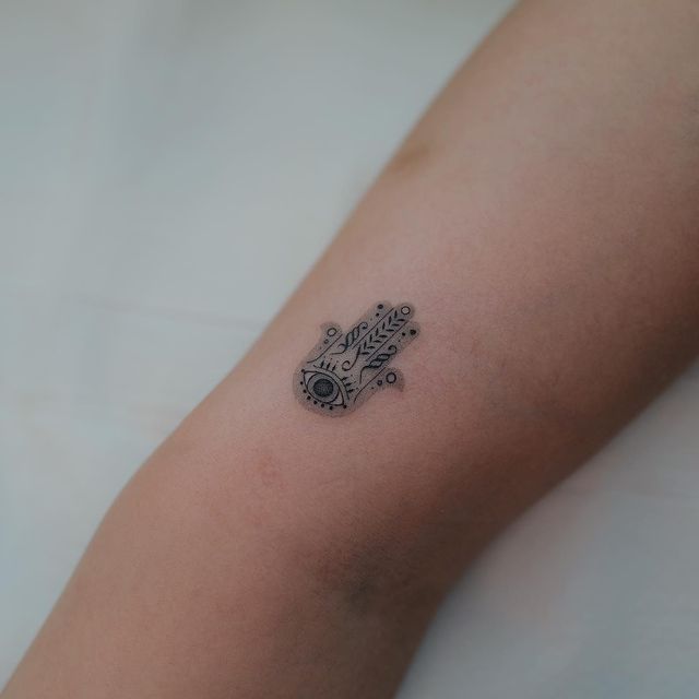 tato simbol keberuntungan