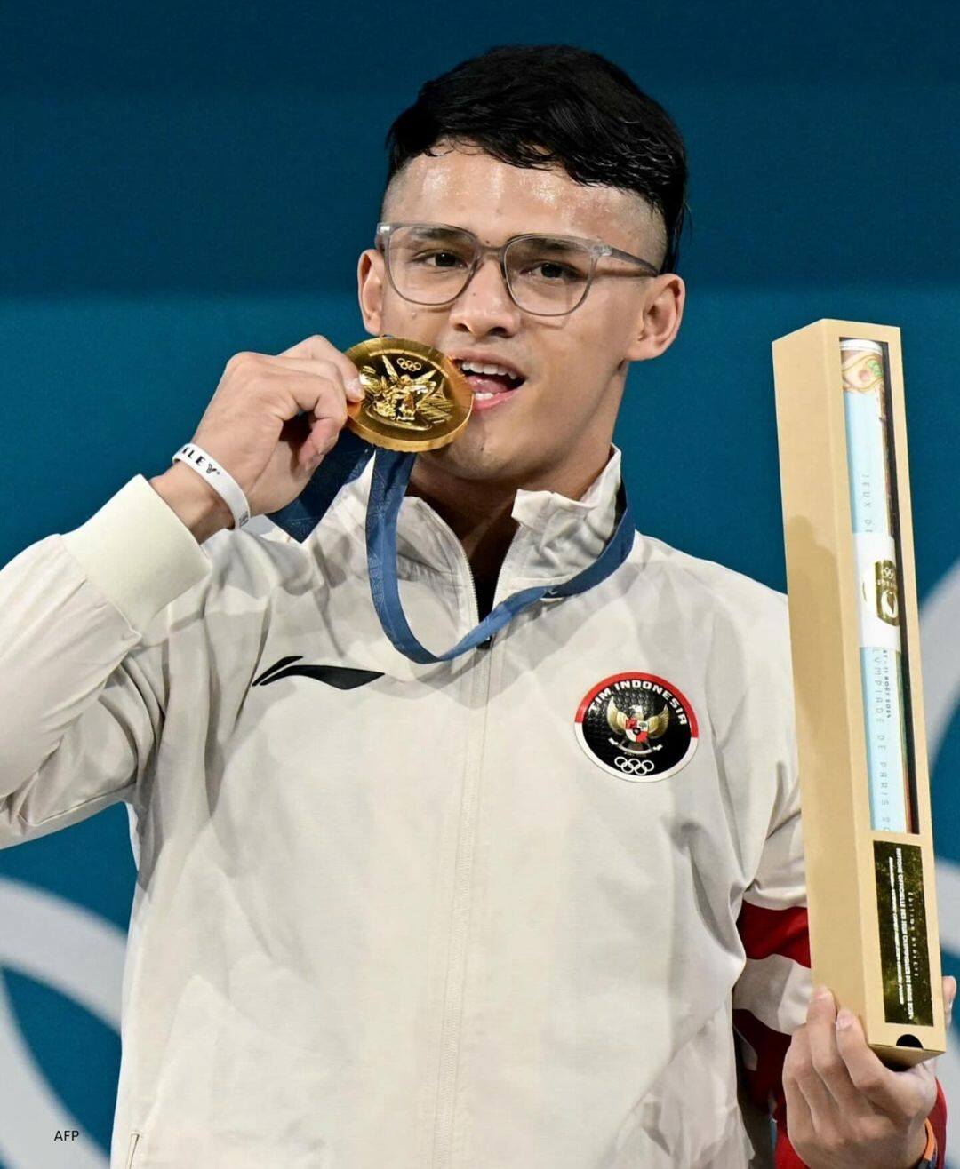 Rizki, atlit, angkat besi, emas, olimpiade paris, 2024