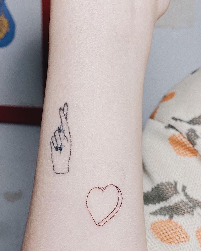 tato simbol keberuntungan