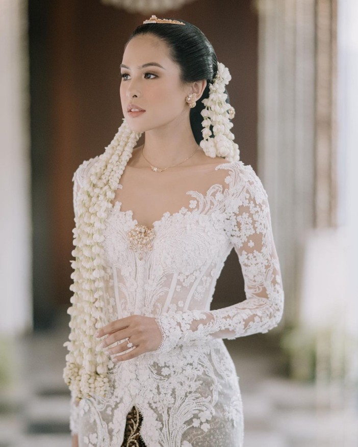 A Dress Fit for a Queen: Unveiling the Majesty of Maudy Ayunda's Wedding Gown