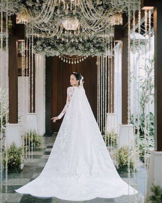 A Dress Fit for a Queen: Unveiling the Majesty of Maudy Ayunda's Wedding Gown